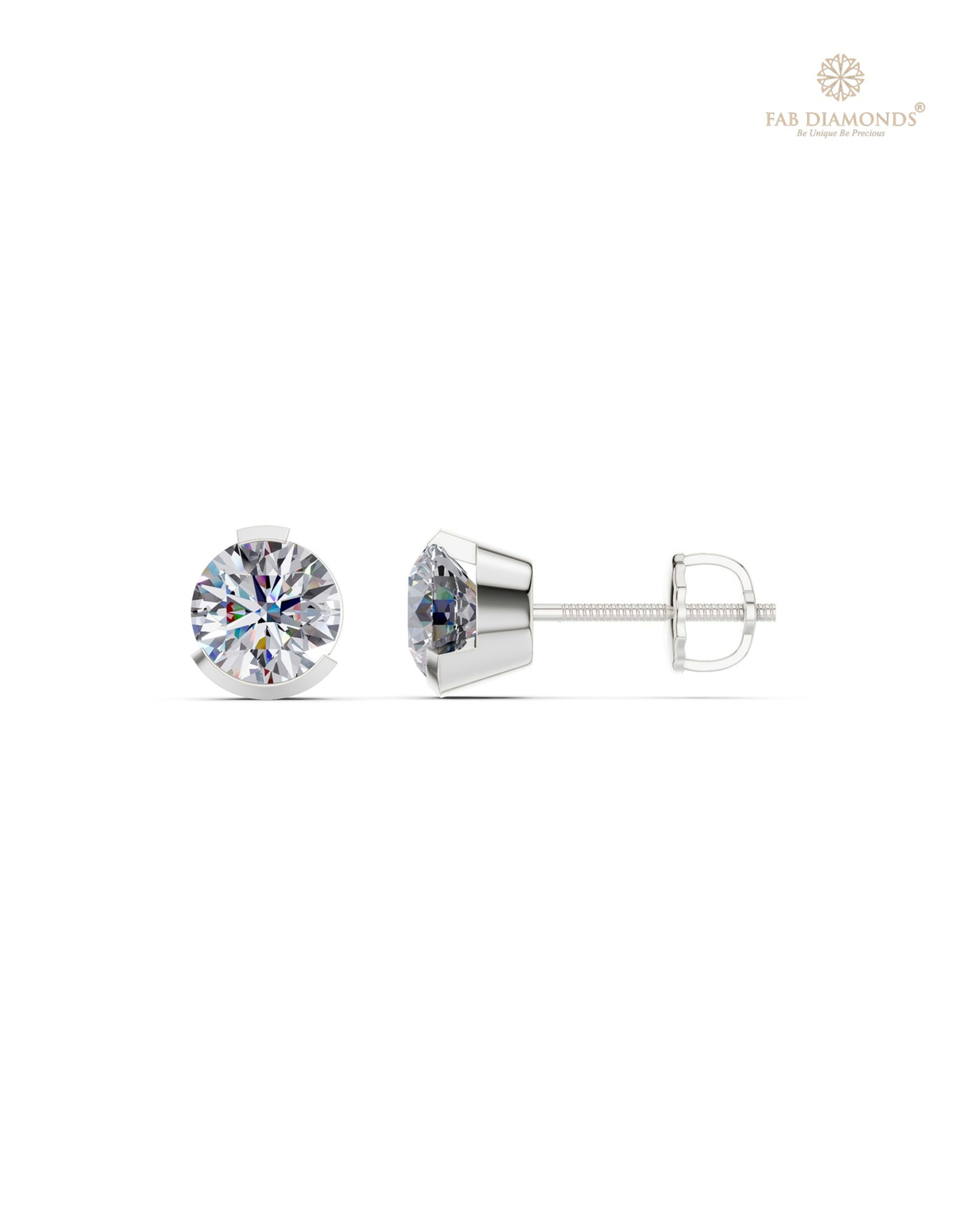 The ES10744 Classic Solitaire Diamond Studs (2.00 Cts) on white atelier plate with FAB hallmark