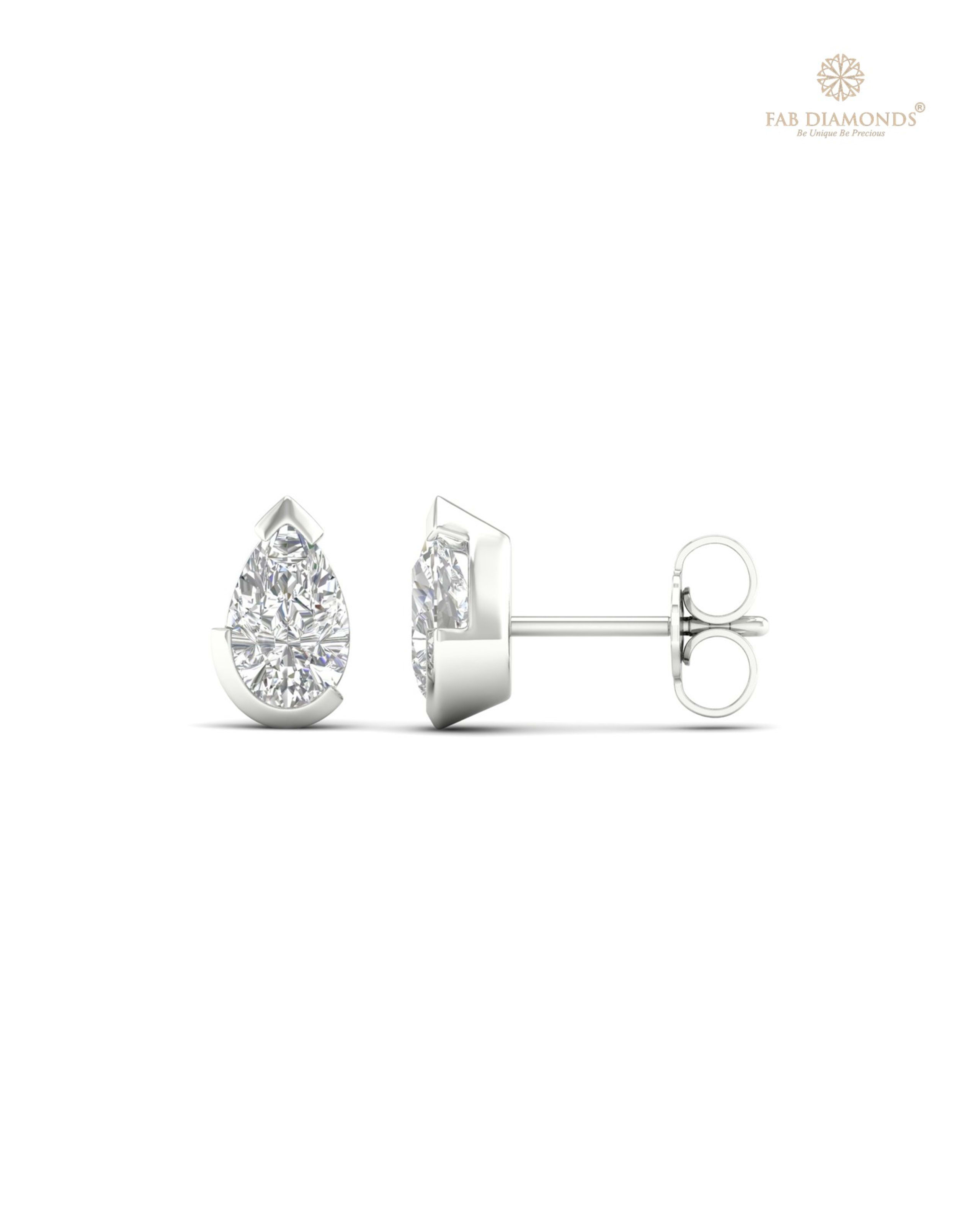 The ES10780 Classic Solitaire Diamond Studs (0.80 Cts) on white atelier plate with FAB hallmark