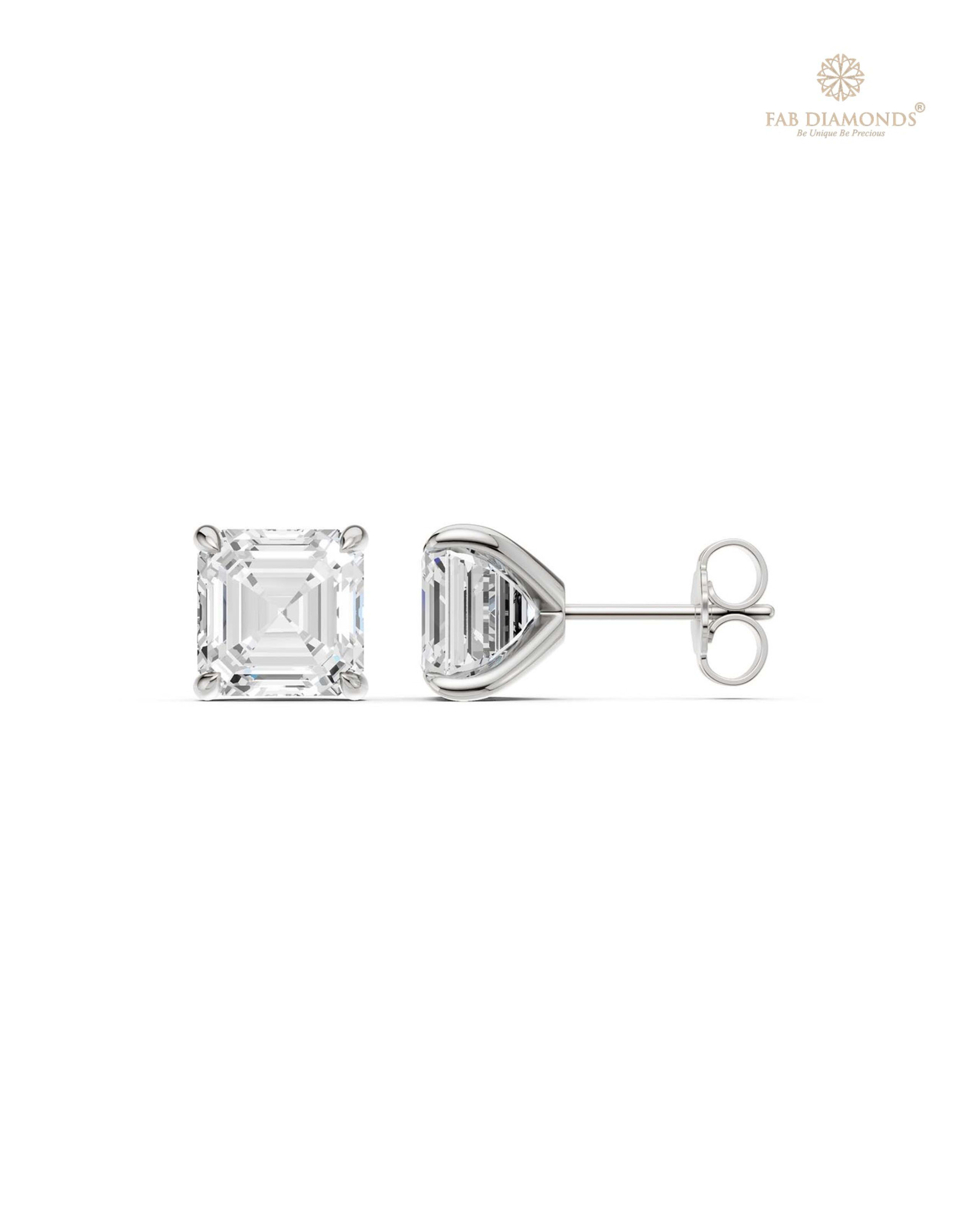 The ES10992 Classic Solitaire Diamond Studs (10.00 Cts) on white atelier plate with FAB hallmark