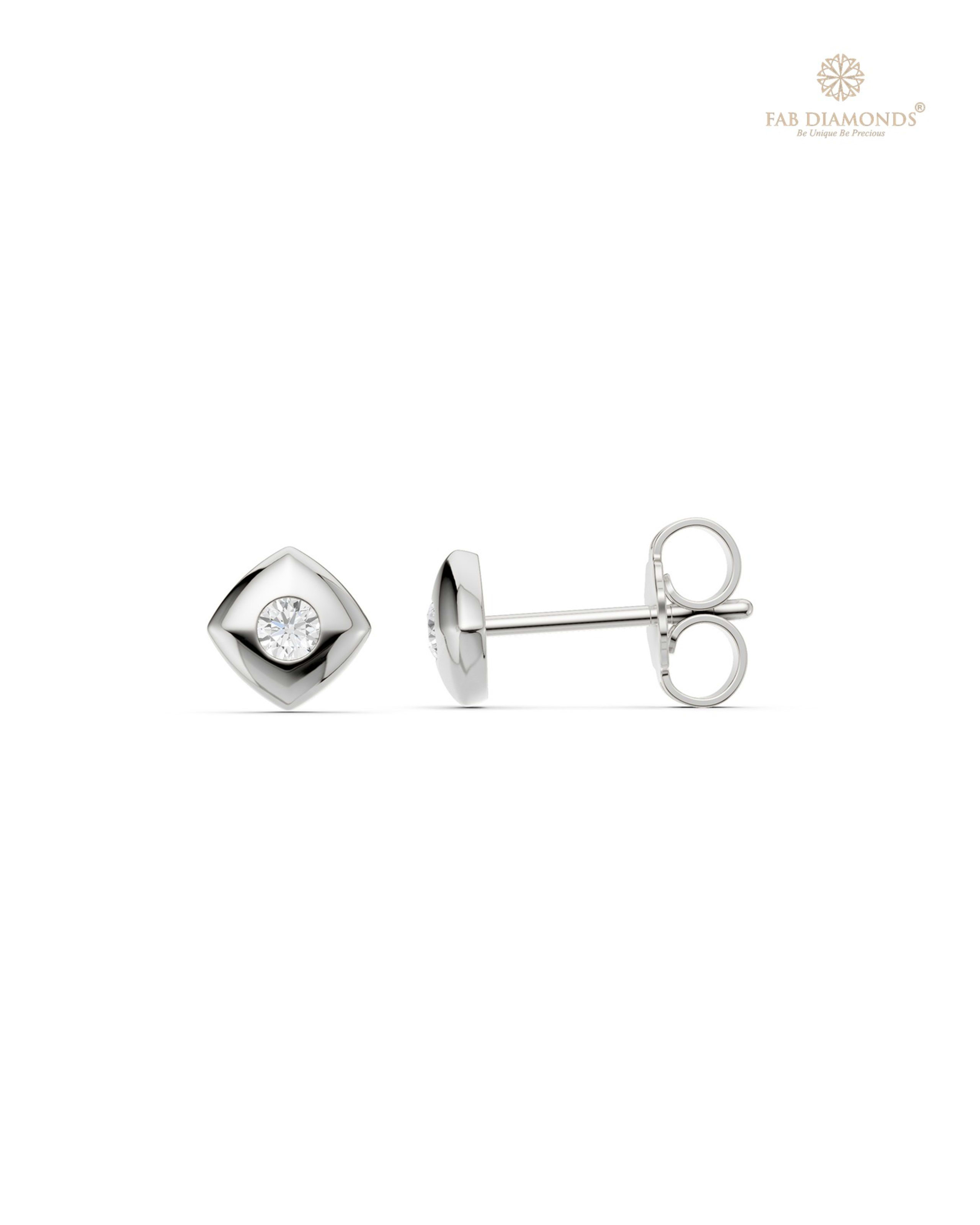 The ES11001 Classic Solitaire Diamond Studs (0.09 Cts) on white atelier plate with FAB hallmark