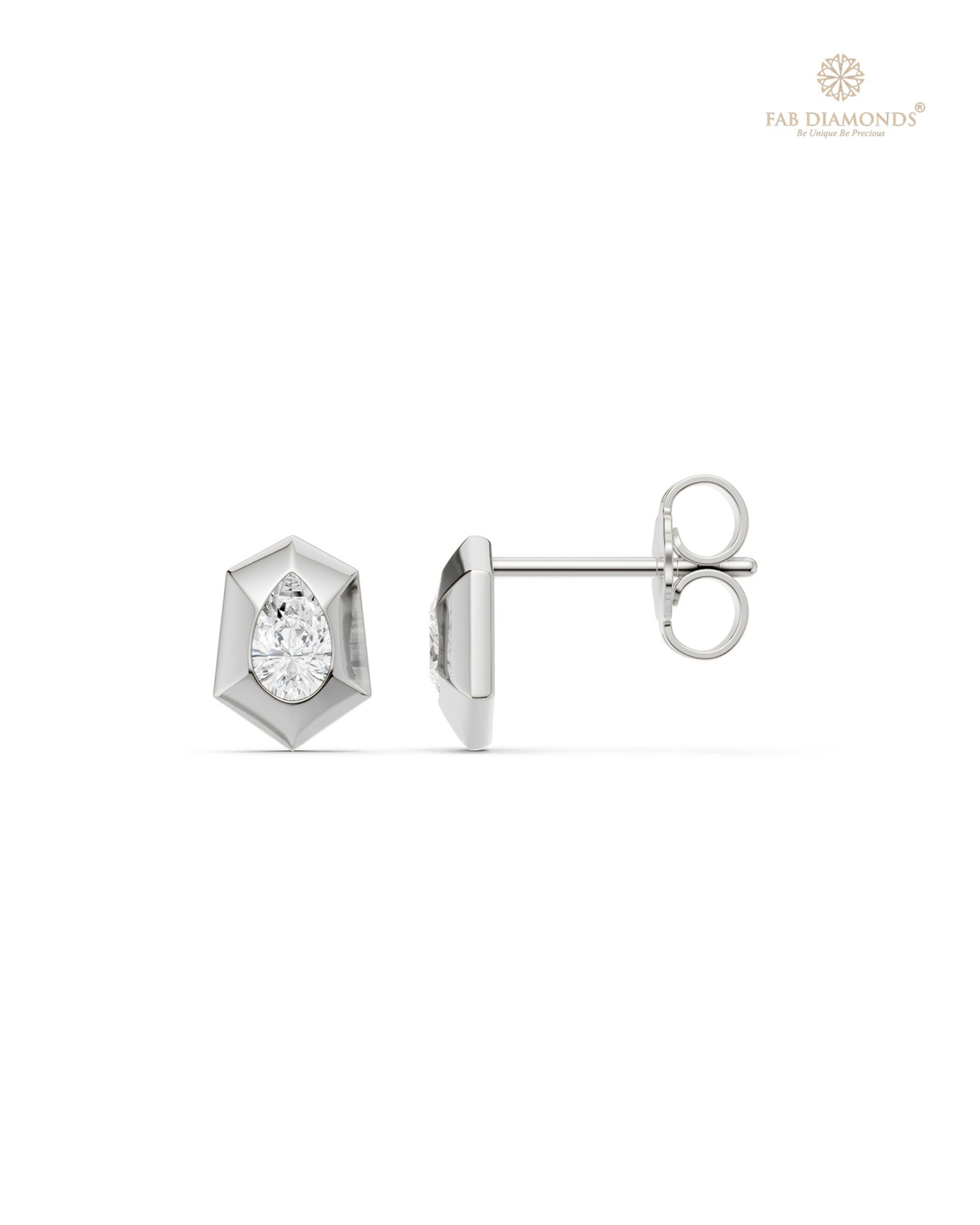 The ES11005 Classic Solitaire Diamond Studs (0.32 Cts) on white atelier plate with FAB hallmark