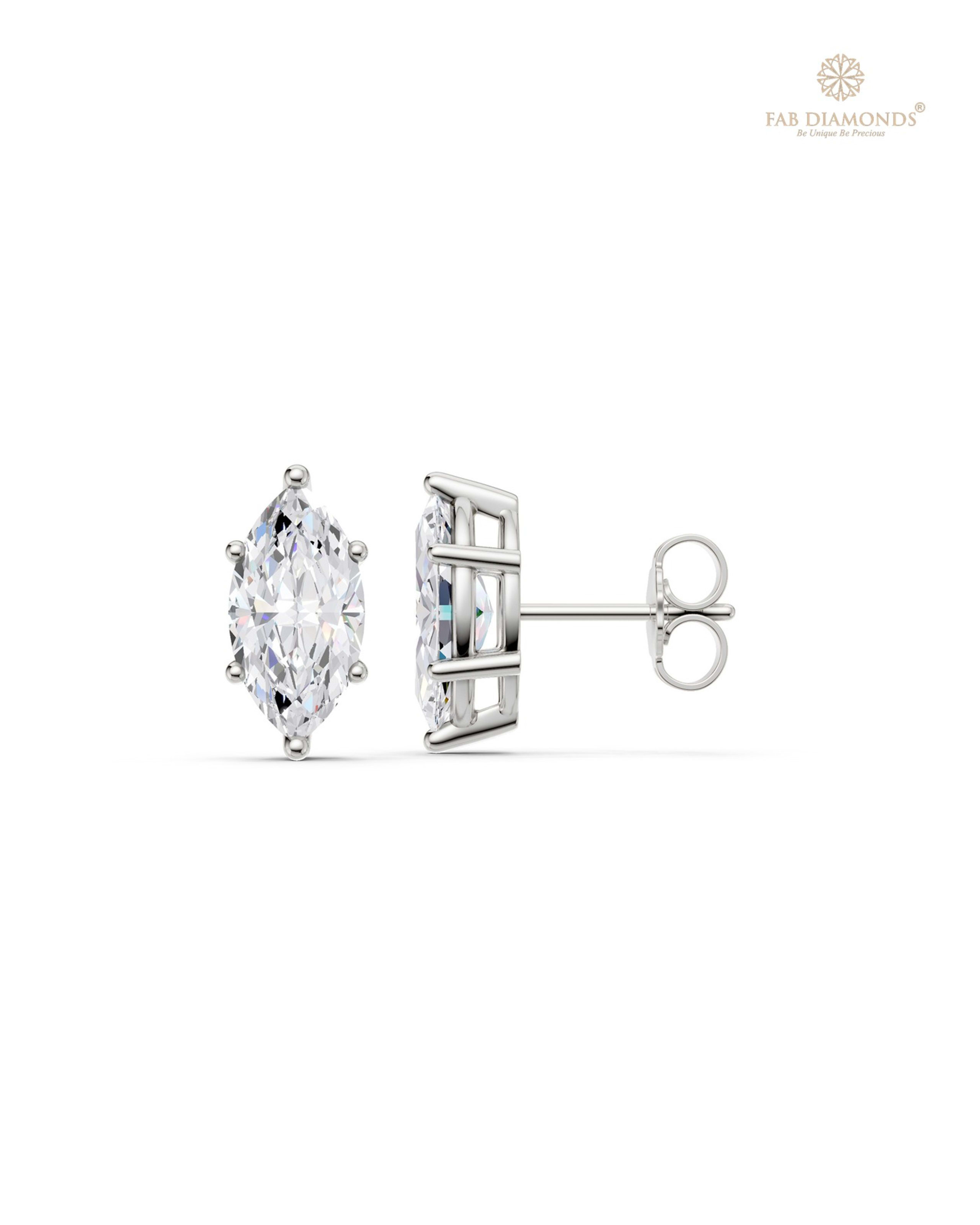 The ES11114 Classic Solitaire Diamond Studs (2.50 Cts) on white atelier plate with FAB hallmark