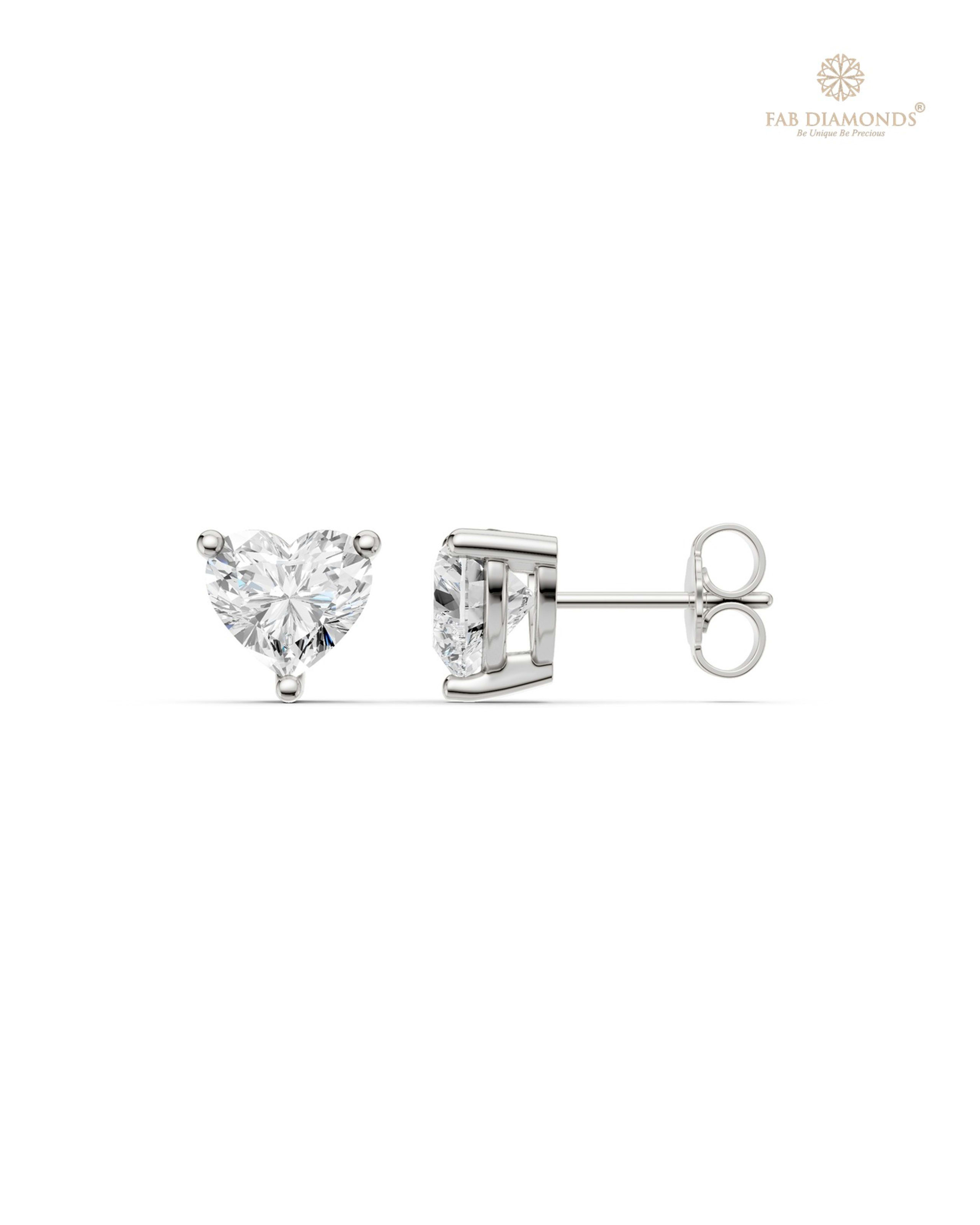 The ES11121 Classic Solitaire Diamond Studs (2.50 Cts) on white atelier plate with FAB hallmark