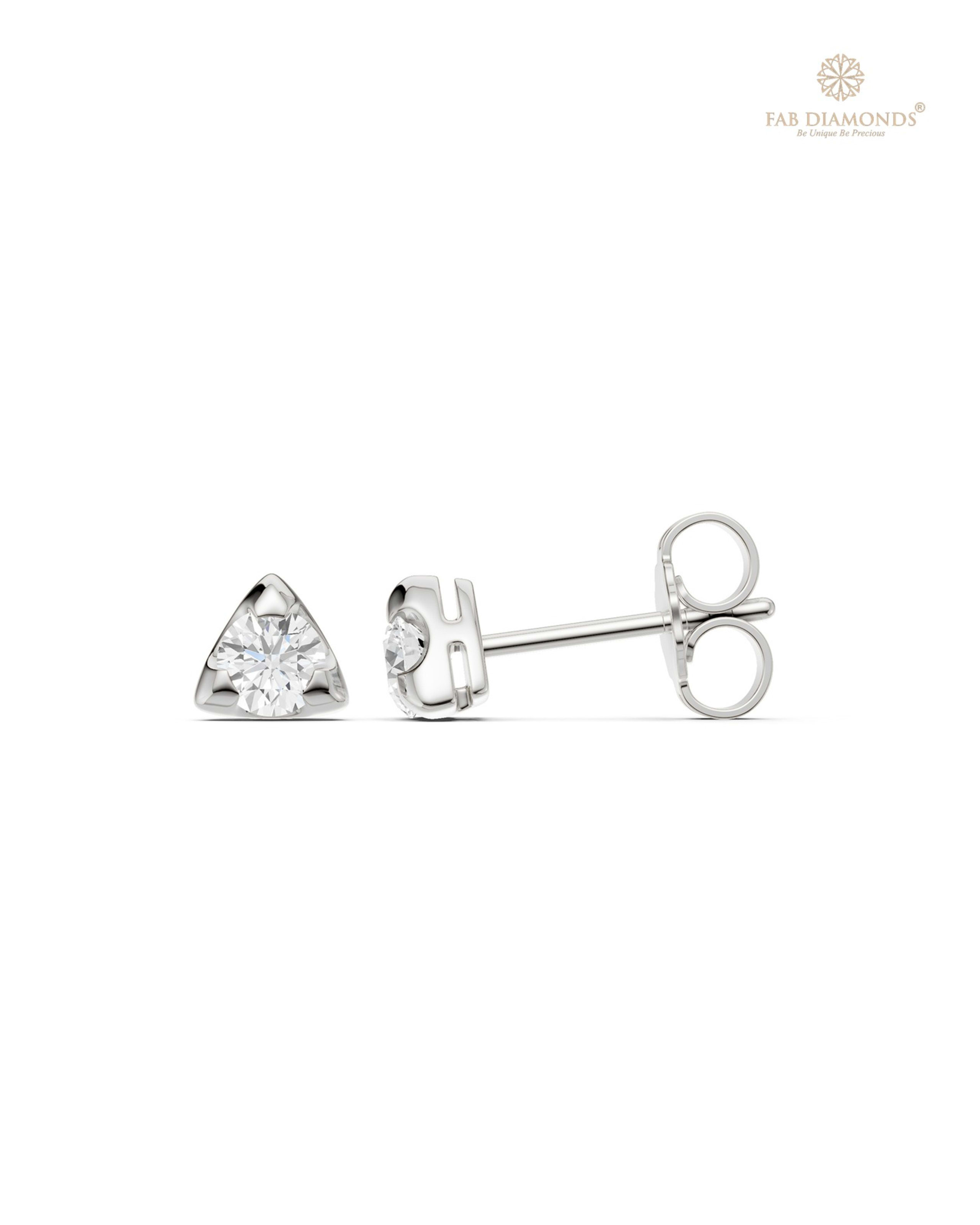 The ES11144 Classic Solitaire Diamond Studs (0.25 Cts) on white atelier plate with FAB hallmark