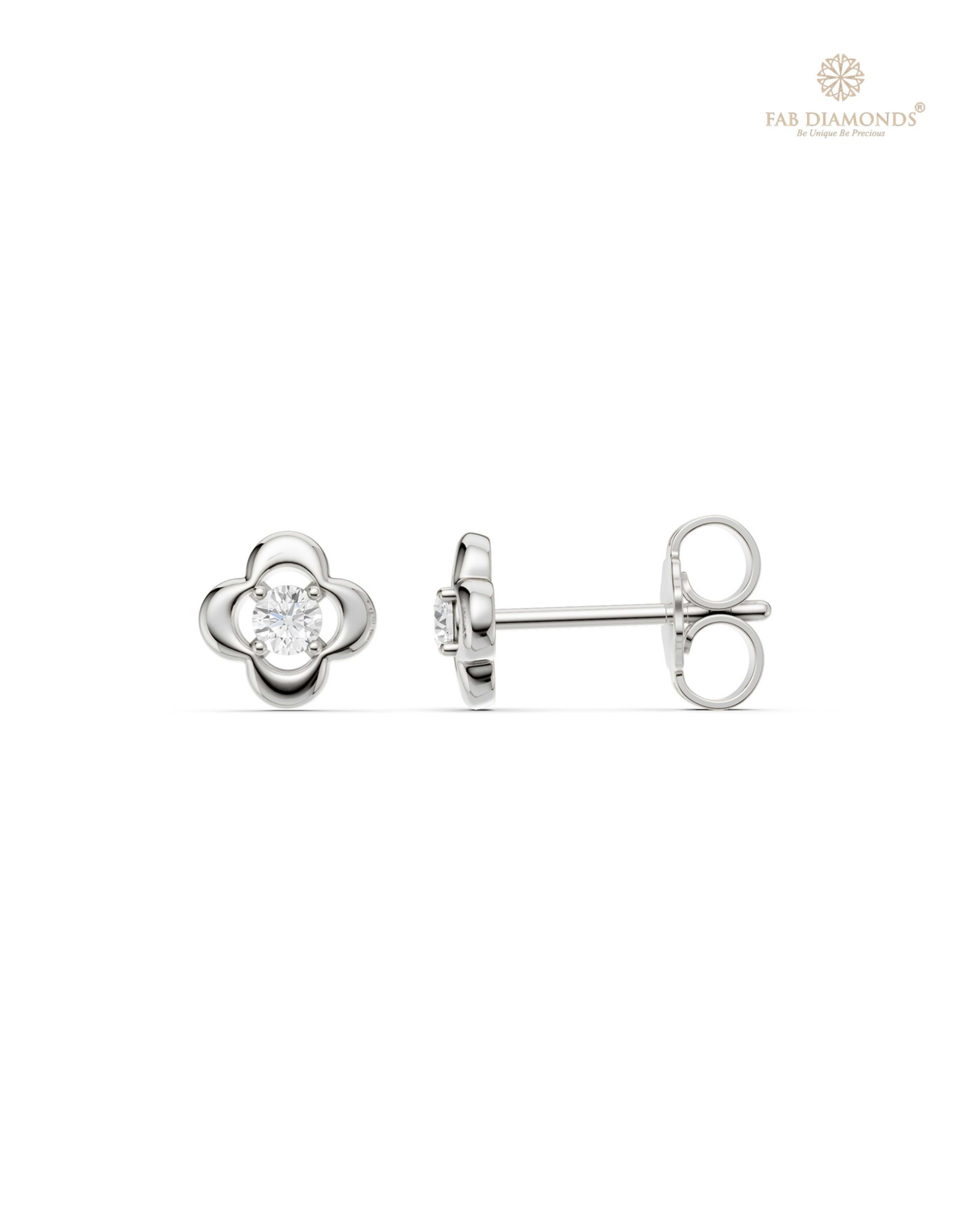 The ES11149 Classic Solitaire Diamond Studs (0.11 Cts) on white atelier plate with FAB hallmark