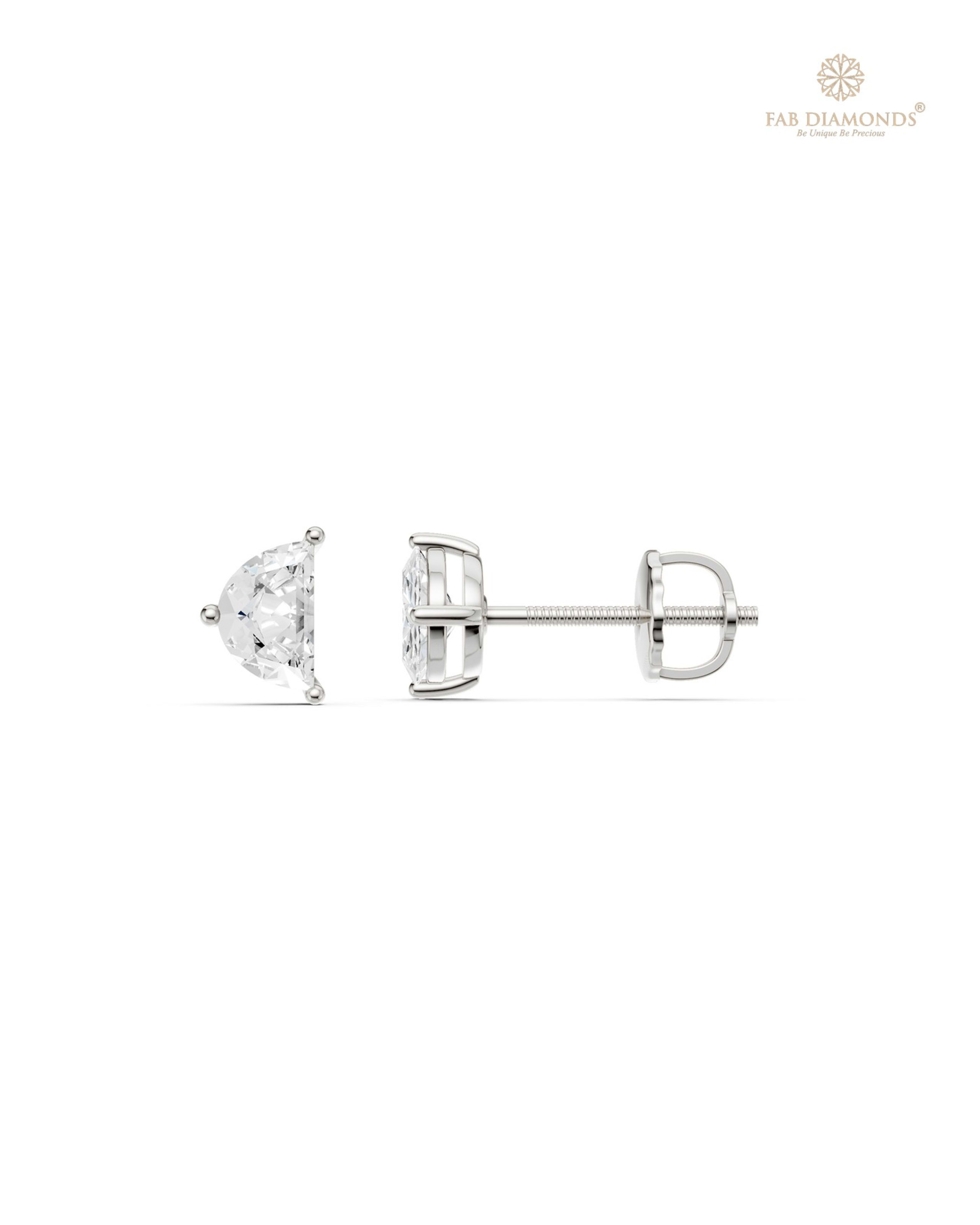 The ES11295 Classic Solitaire Diamond Studs (0.50 Cts) on white atelier plate with FAB hallmark