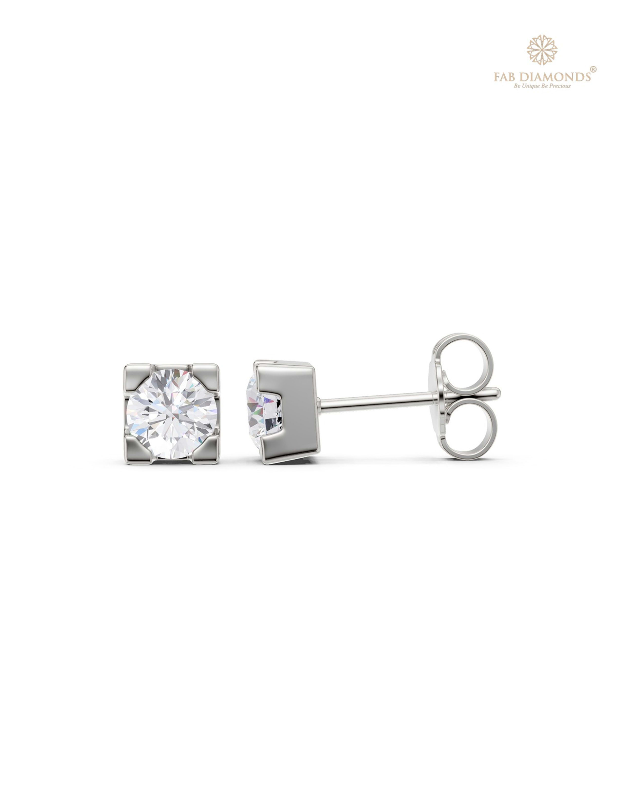 The ES11327 Classic Solitaire Diamond Studs (1.00 Cts) on white atelier plate with FAB hallmark
