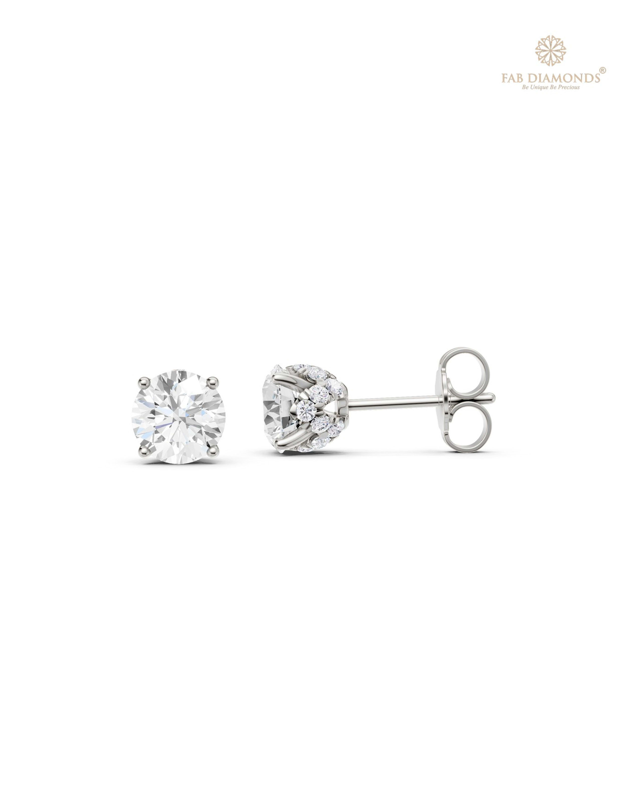 The ES11331 Diamond Halo Diamond Studs (2.14 Cts) on white atelier plate with FAB hallmark