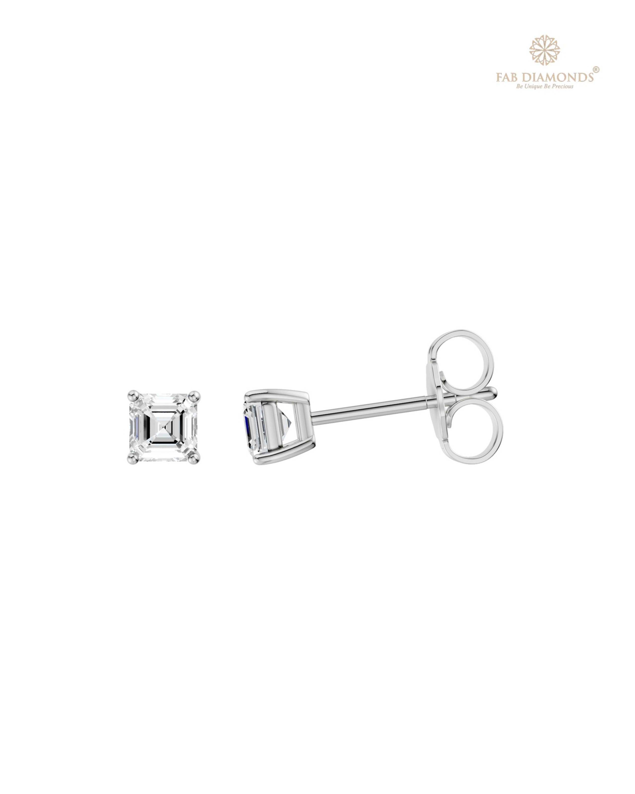 The ES11639 Classic Solitaire Diamond Studs (0.50 Cts) on white atelier plate with FAB hallmark