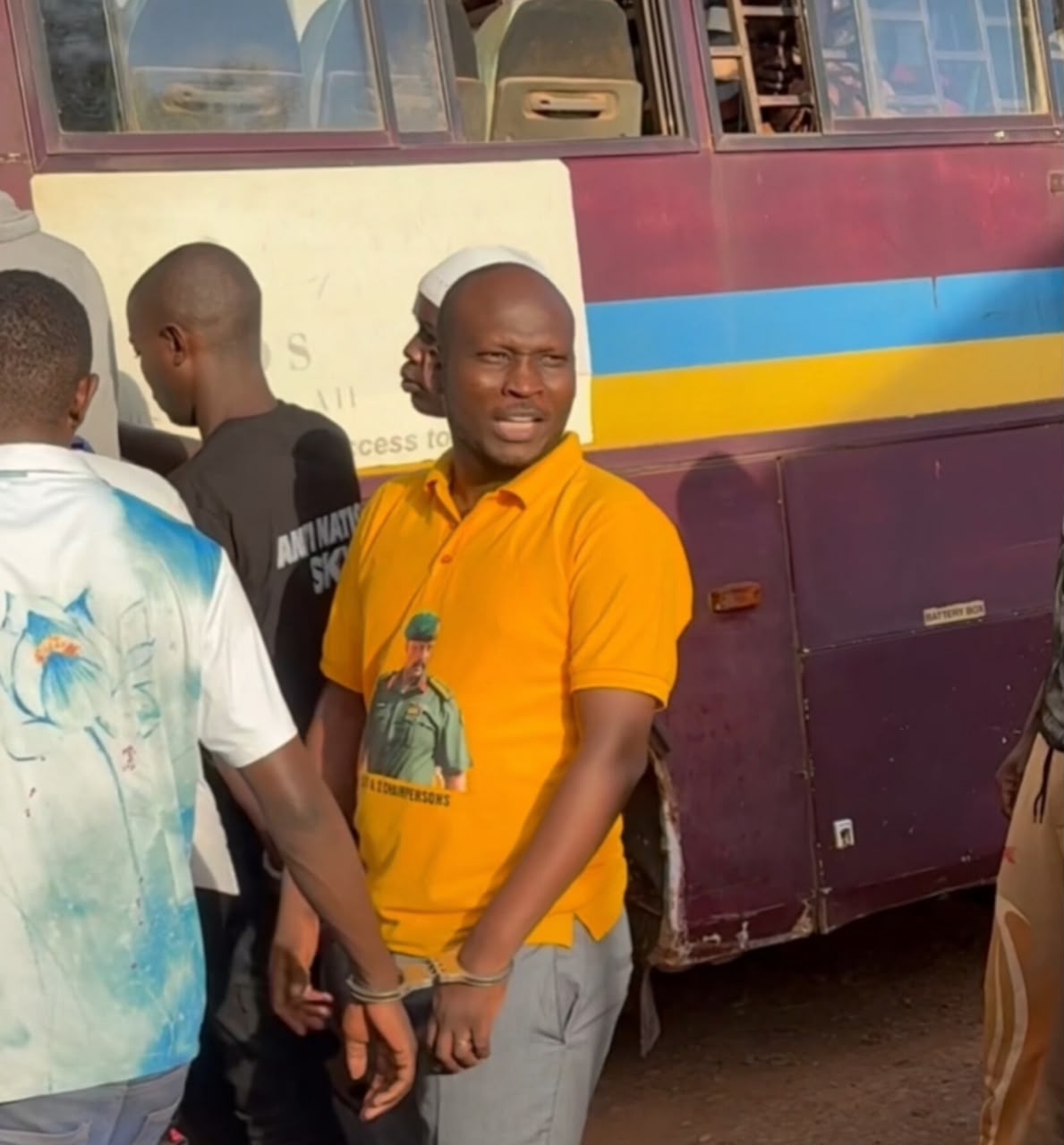 Norbert in PLU shirt during the Wakiso baraza