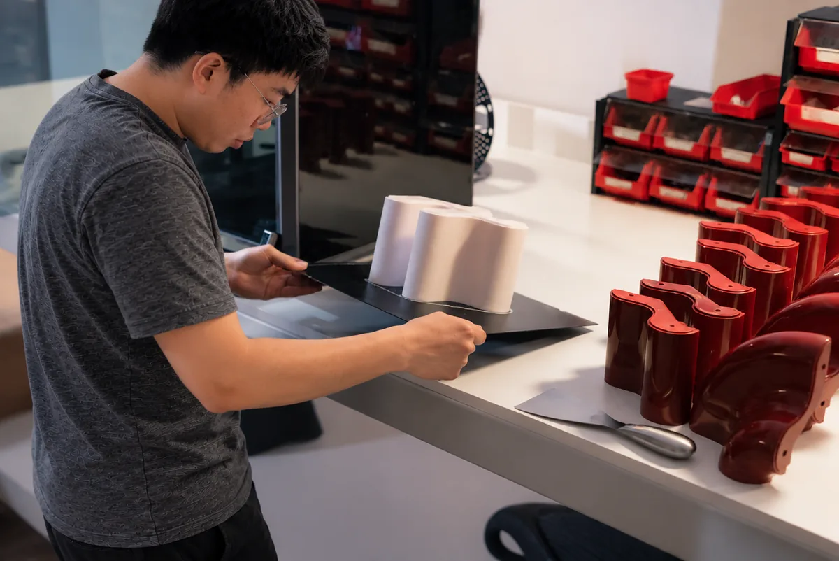 Engineering workbench scene with prototypes and product samples