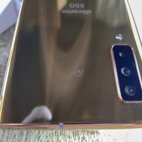 docomo arrows NX9 F-52A ゴールド SIMフリー 赤ロムの画像（3）