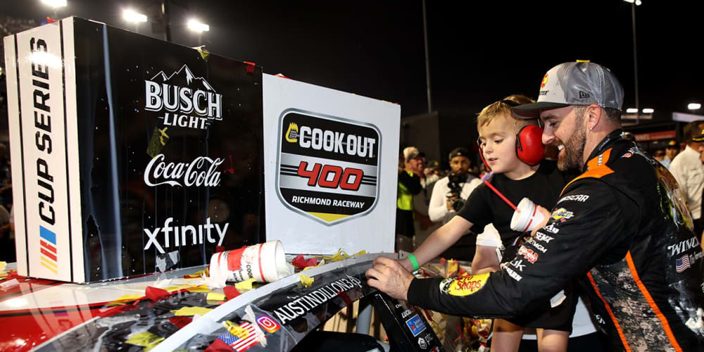 Austin Dillon places the winner sticker on his No. 3 Richard Childress Racing Chevrolet after his NASCAR Cup Series win at Richmond Raceway.