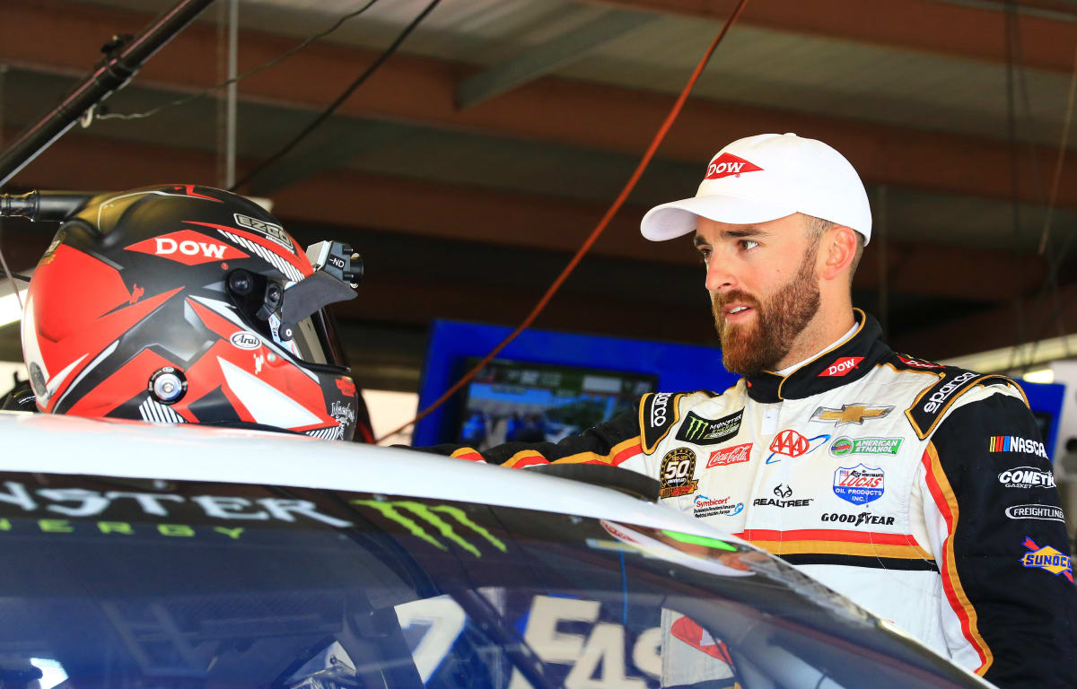 Austin Dillon faces off with his Dow helmet before taking his qualifying laps at Michigan.