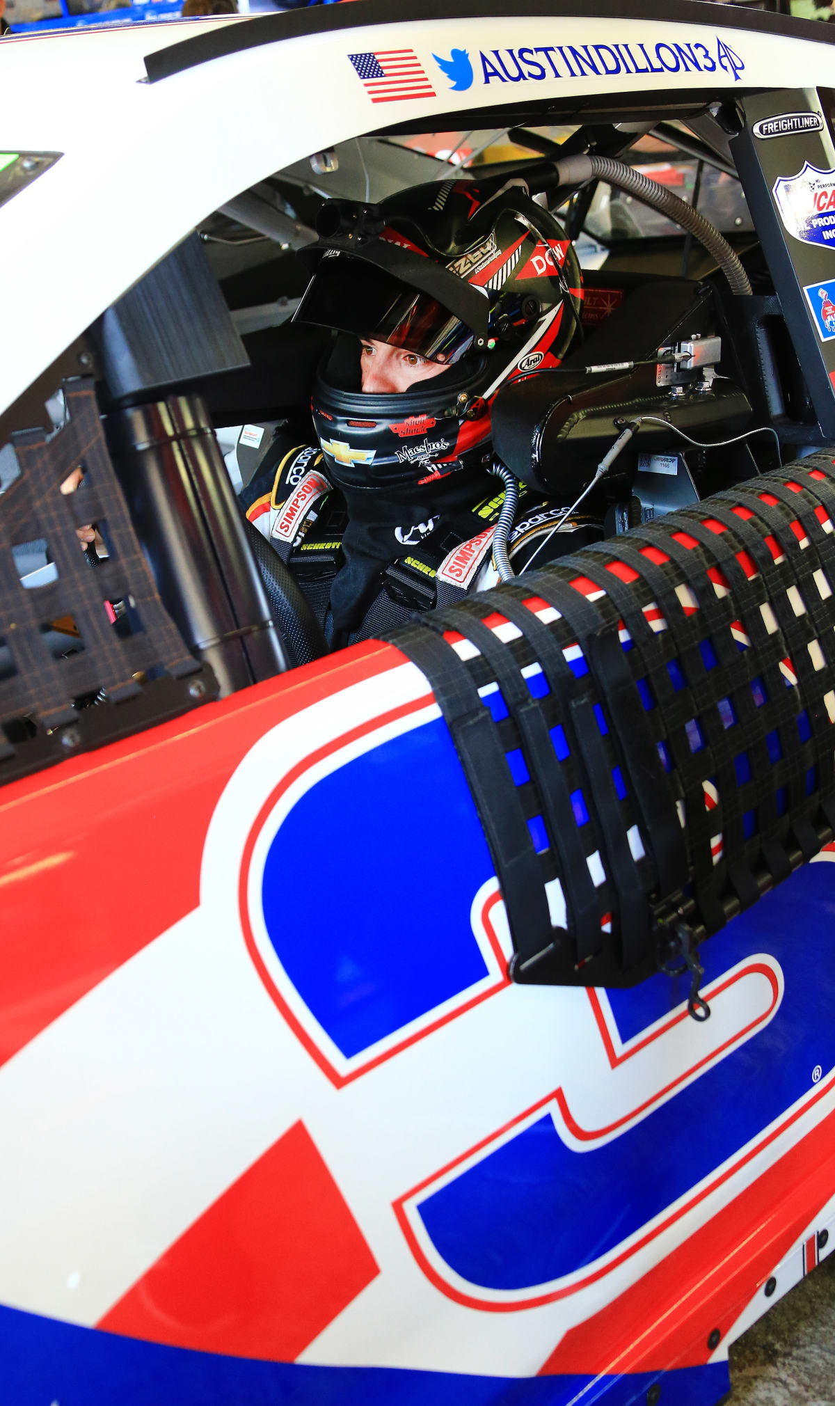 Austin Dillon straps into his No. 3 Dow Salutes Veterans Chevrolet Camaro ZL1 for his first practice run at Michigan International Speedway.