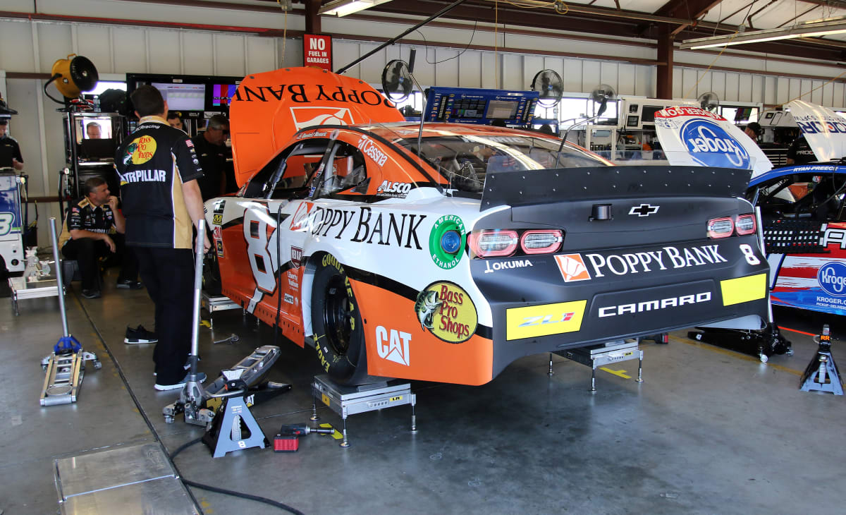 The No. 8 Poppy Bank team gives their Chevrolet Camaro ZL1 one final checkout before rolling out for practice.