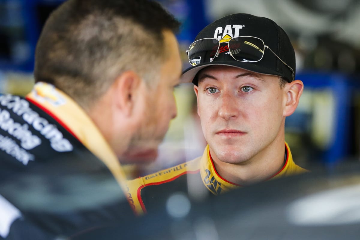 Daniel Hemric talks strategy with his team before the final practice session at Pocono Raceway.