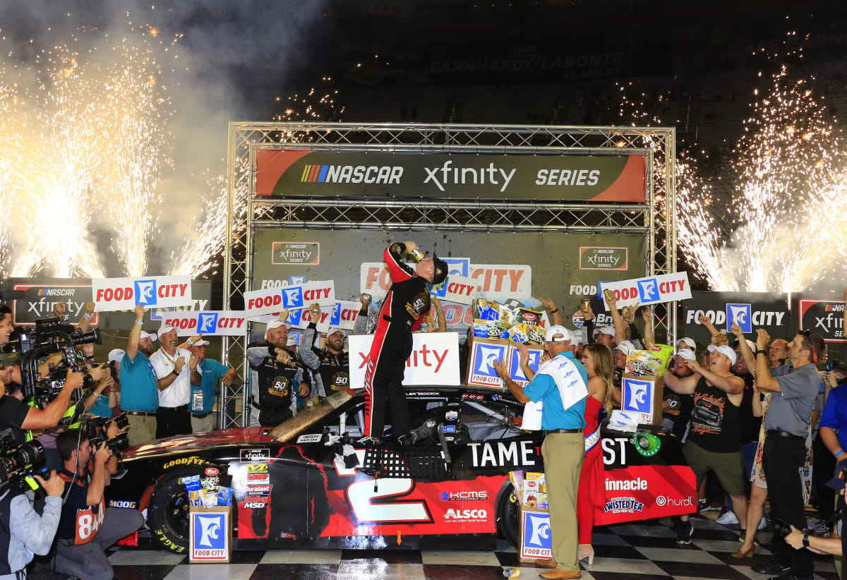 Tyler Reddick takes a drink of Twisted Tea after climbing victorious from his No. 2 Tame the Beast Chevrolet at Bristol Motor Speedway.