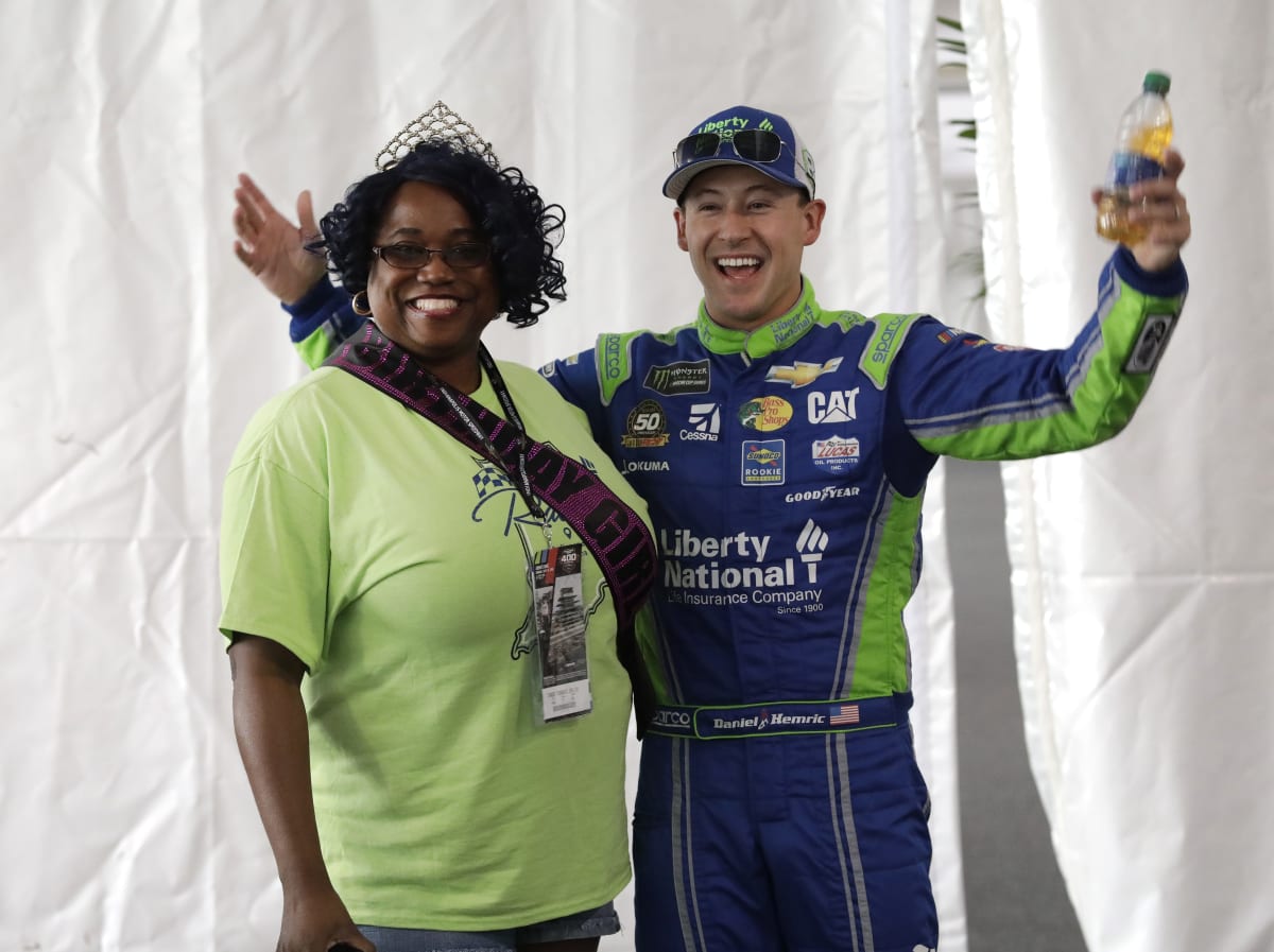 Daniel Hemric leads a group of Liberty National guests in singing happy birthday to one of the Liberty National agents prior to Sunday's race at Indianapolis Motor Speedway. (HHP/Garry Eller)