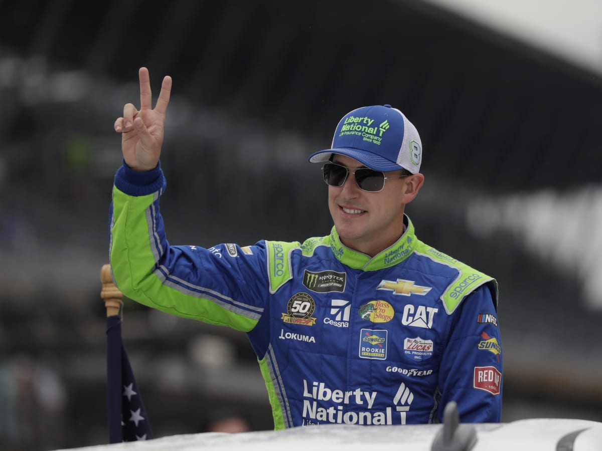 Daniel Hemric waves to the crowd during his lap around the track following driver introductions at Indianapolis Motor Speedway. (HHP/Harold Hinson)