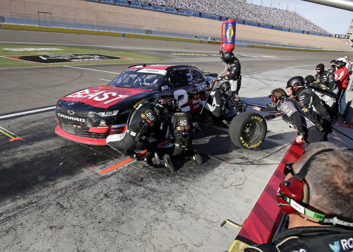 The No. 2 TAME the BEAST team get to work during a pit stop during Saturday's race.