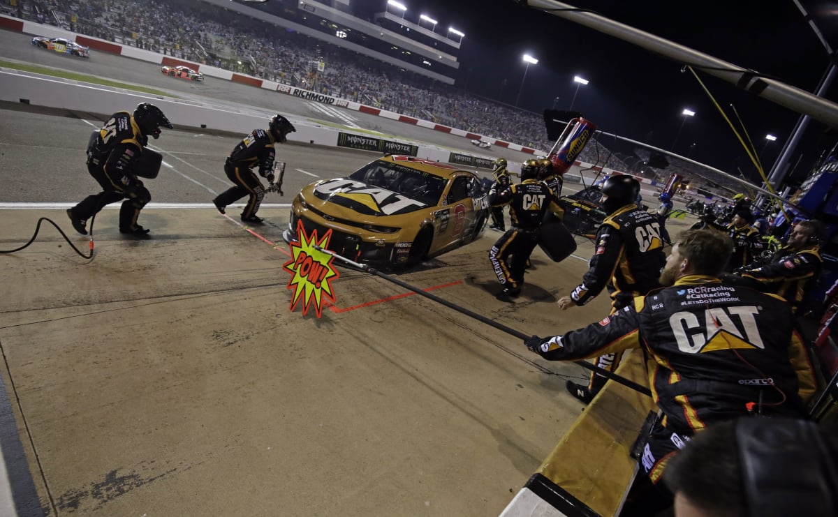 Daniel Hemric's No. 8 Caterpillar Chevrolet hits the sign on his final pit stop of the night.