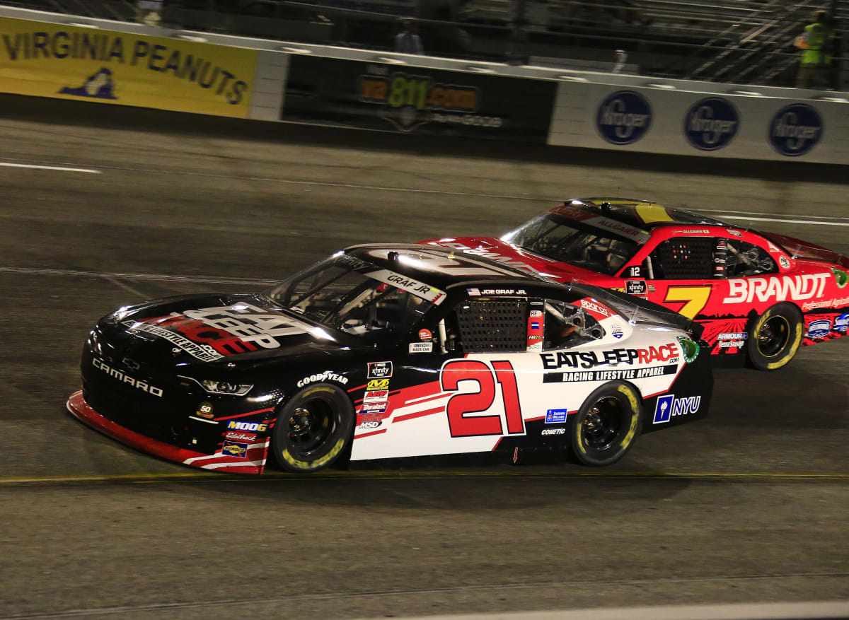 Joe Graf Jr.'s No. 21 Eat Sleep Race Chevrolet races under Justin Allgaier's No. 7 Chevrolet during Friday night's NASCAR Xfinity Series race at Richmond Raceway.