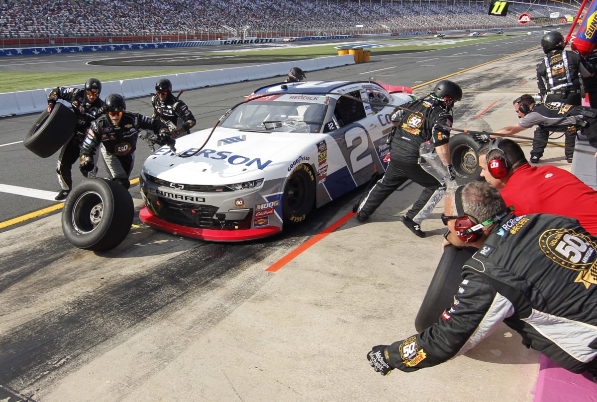 Tyler Reddick sits on pit road as the crew services the No. 2 Emerson Chevrolet during Saturday's race at the Roval. Reddick fought back to finish second.