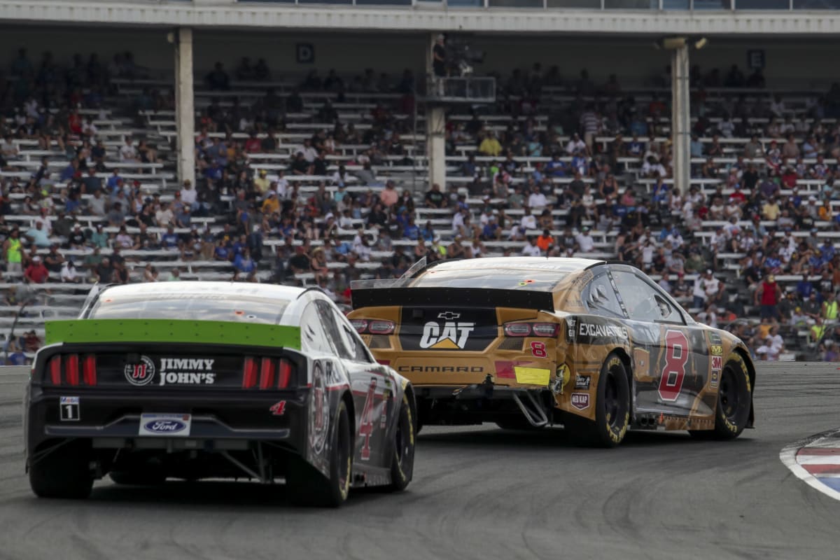 Daniel Hemric's No. 8 Caterpillar Next Gen Excavators Chevrolet tries to hold off Kevin Harvick for the race lead. A strategy call allowed Hemric to lead two laps during Sunday's race at the Roval.