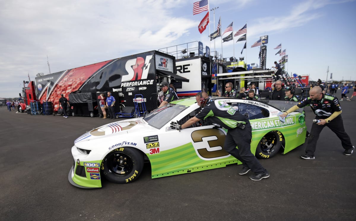 The No. 3 road crew push Austin Dillon's American Ethanol/RCR 50th Chevrolet out for a qualifying run during Friday's final practice at Talladega Superspeedway.