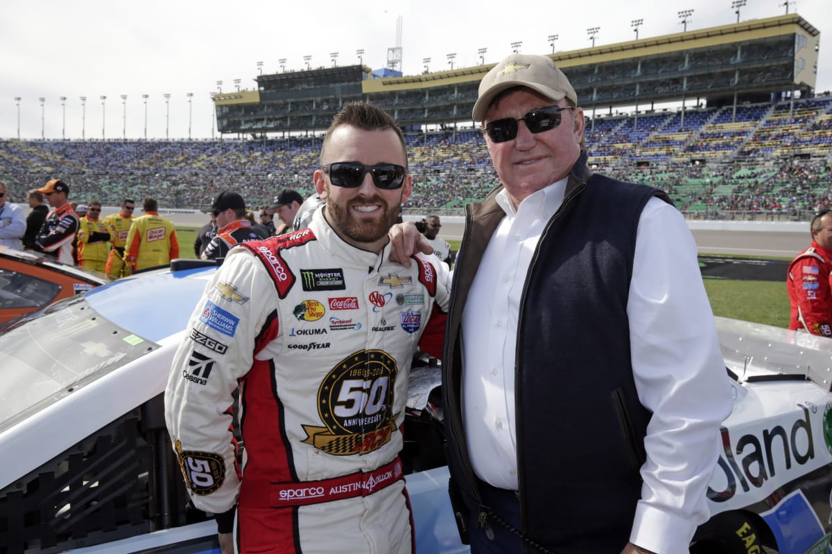 Austin Dillon and Richard Childress pose for a picture on the grid prior to Sunday's NASCAR Cup Series race at Kansas Speedway.