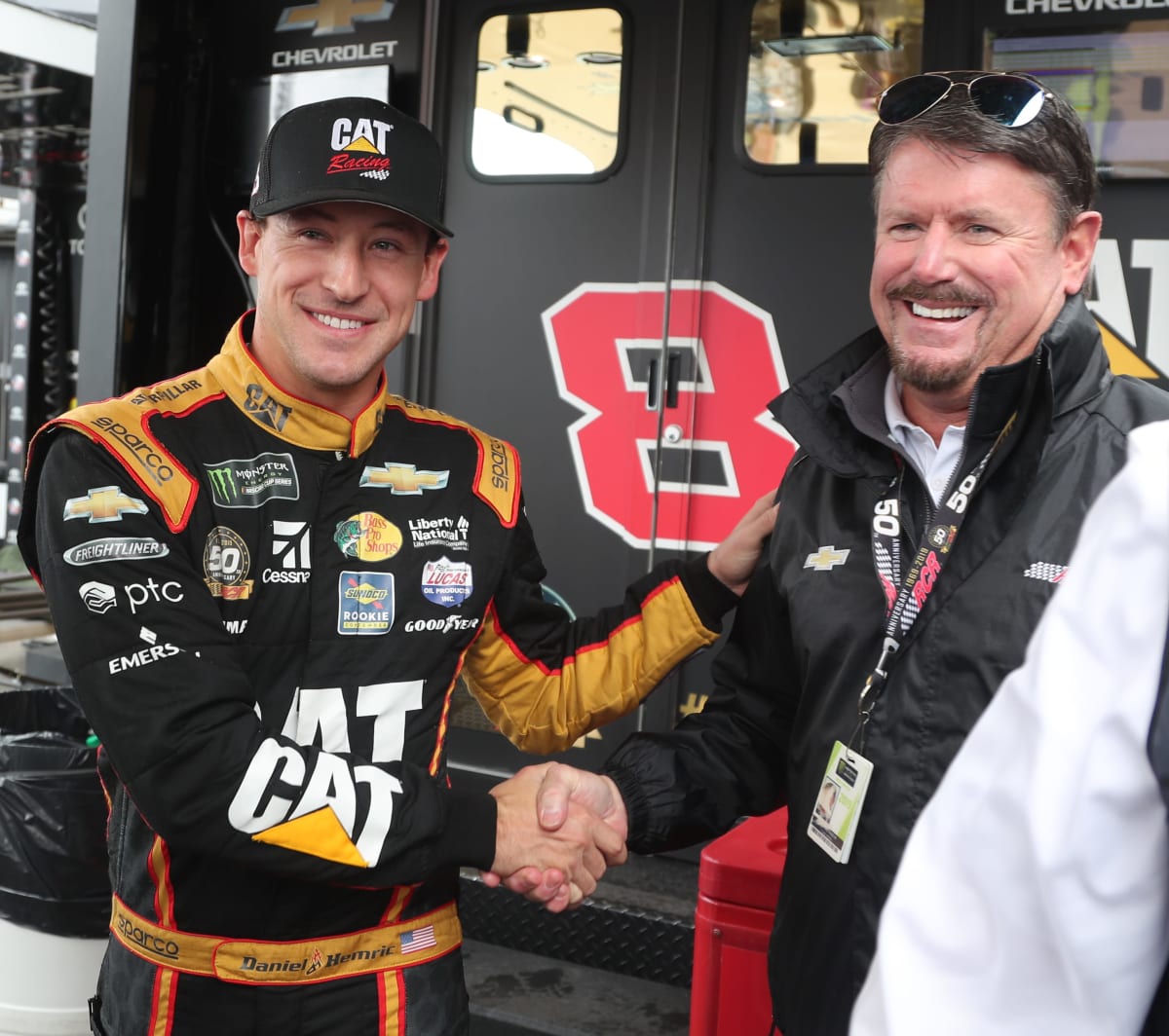 Daniel Hemric shakes hands with Andy Petree after winning his first career NASCAR Cup Series pole Saturday at Kansas Speedway.