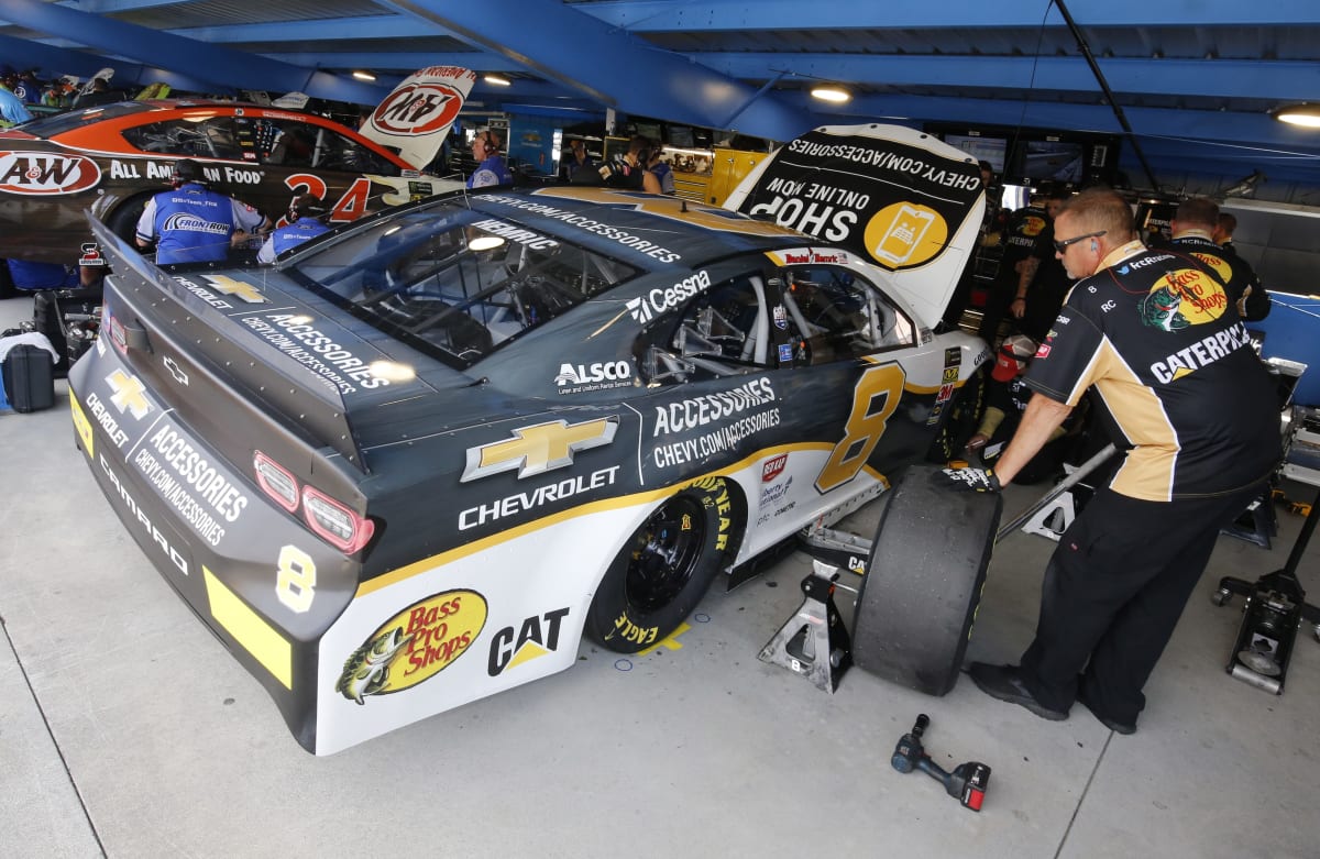 The No. 8 Chevrolet Accessories team works on the balance of their Camaro ZL1 in between practice runs.