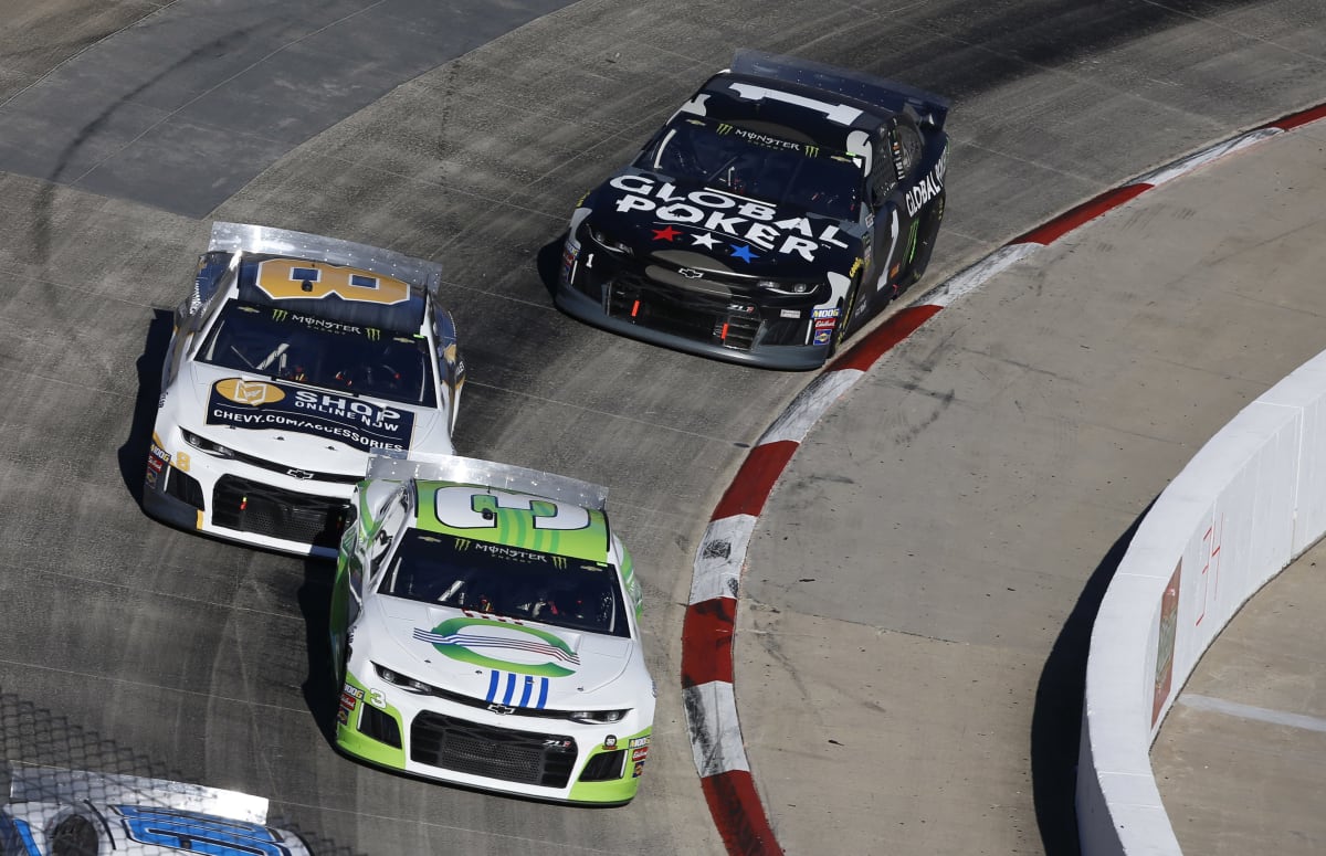 Austin Dillon and Daniel Hemric move through the field during Sunday's race at Martinsville.