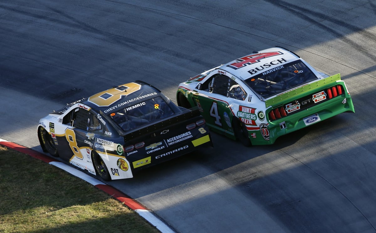 Daniel Hemric squeezes by a competitor during Sunday's race.