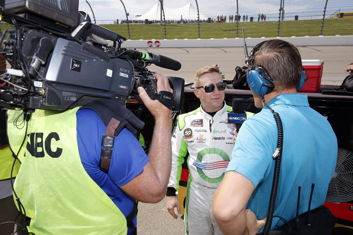 Tyler Reddick stops to chat with the media before taking the grid for his qualifying laps.