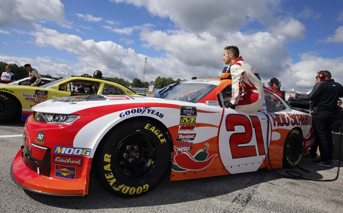 Kaz Grala climbs in the No. 21 Hot Scream Chevrolet for qualifying at Road America.