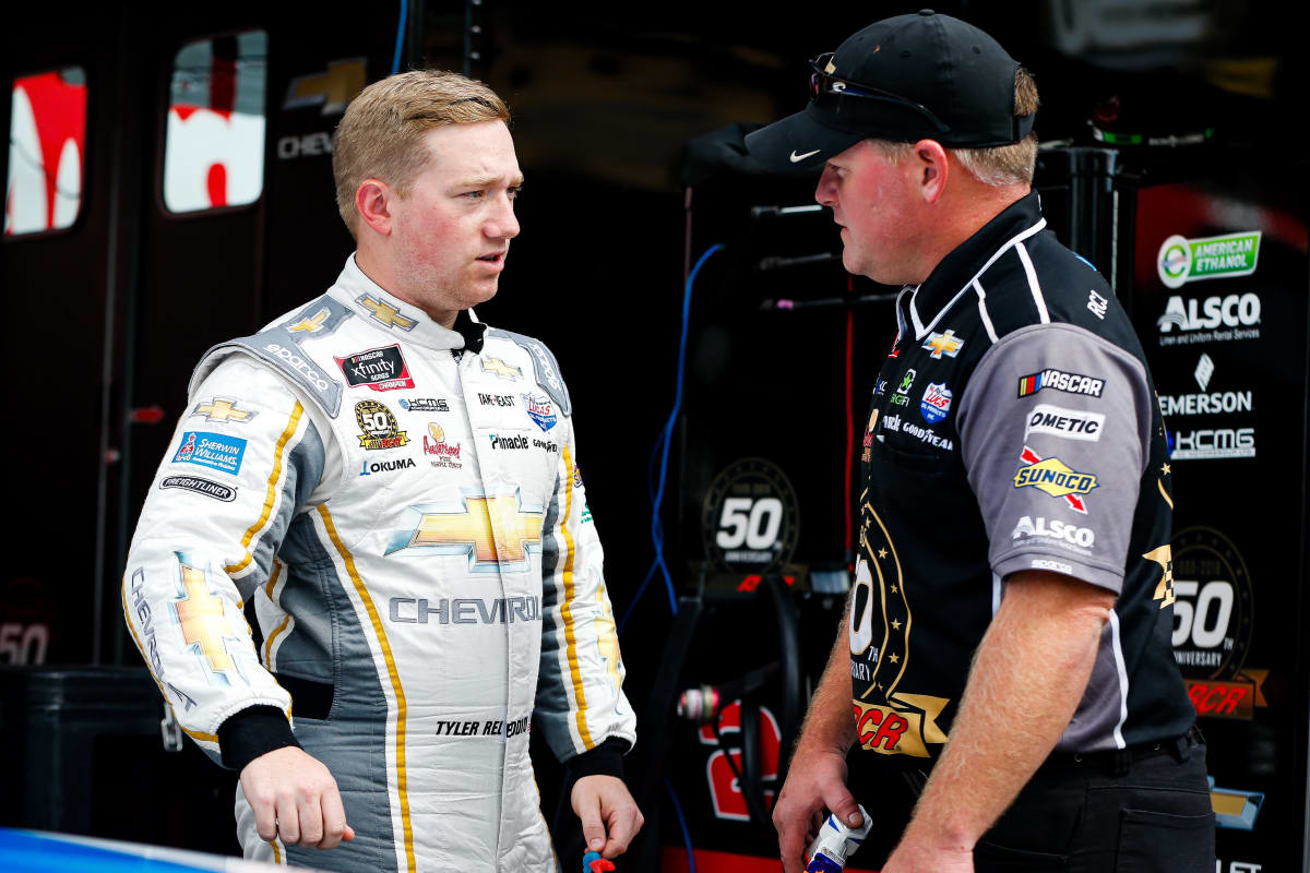 Tyler Reddick talks with car chief Cam Strader after practice at Road America.