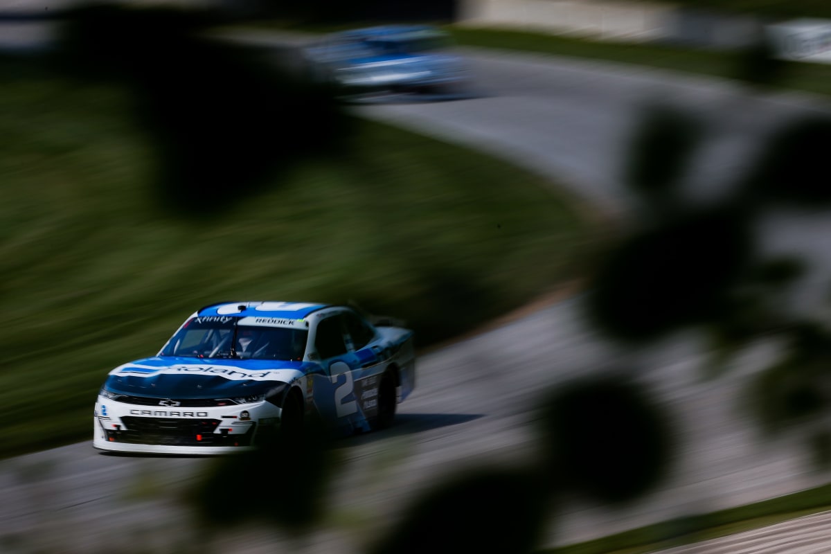 Tyler Reddick's No. 2 Roland Chevrolet races around a right-hand corner during Saturday's race at Road America.