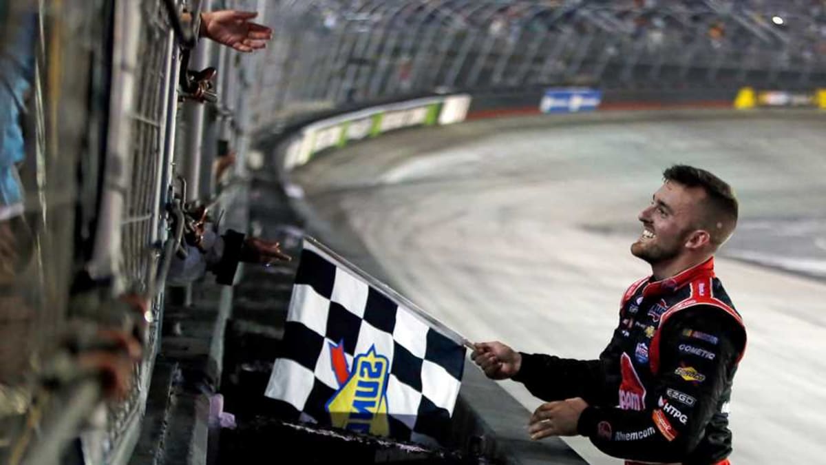 Austin Dillon literally taking the checkered flag.