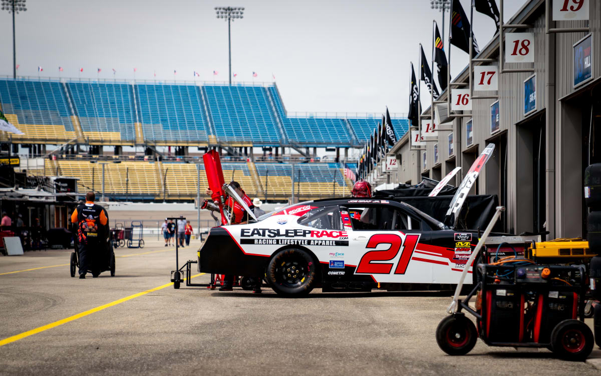 Joe Graf Jr. brings his No. 21 Eat Sleep Race Chevrolet to the attention of his team after his first practice run.