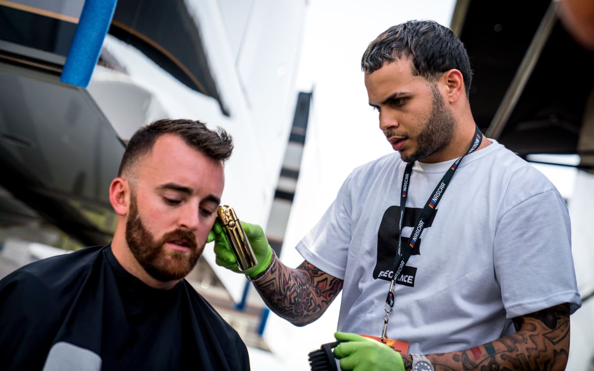 ARod touches up the Million-Dollar haircut moments before Austin Dillon heads to driver intros at Chicagoland Speedway.
