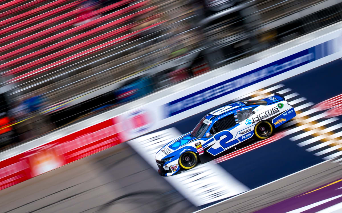 The checkered flag is waved in the favor of the No. 2 KC Motorgroup team.