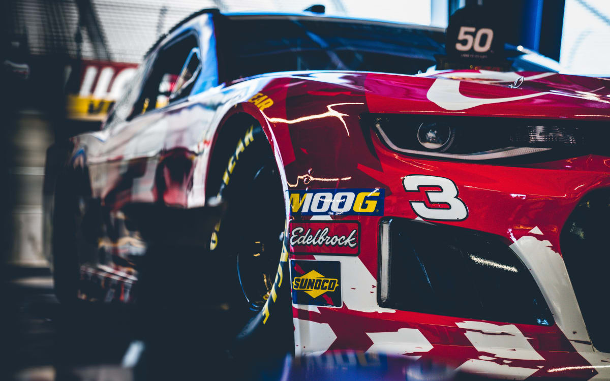 Austin Dillon's No. 3 AAA Chevrolet sits in the garage prior to opening practice at Dover.