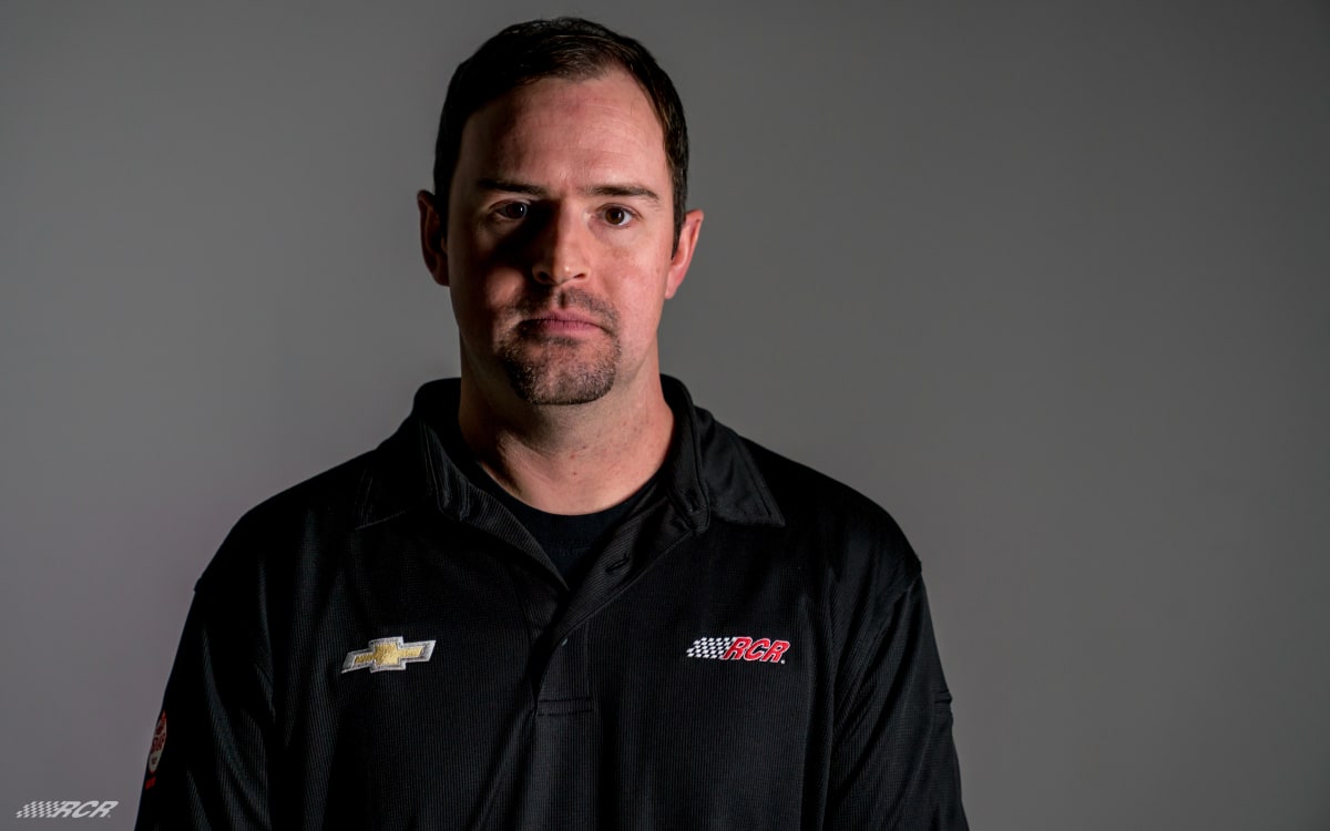 Richard Childress climbs in the driver seat of the No. 3 GM Goodwrench Chevrolet for the parade laps around Talladega Superspeedway.