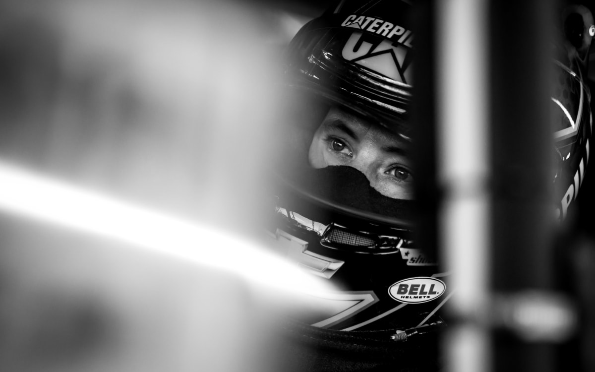 Daniel Hemric waits to take the No. 8 Cat Large Dozers Chevrolet back out for another practice run in the opening session at ISM Raceway.