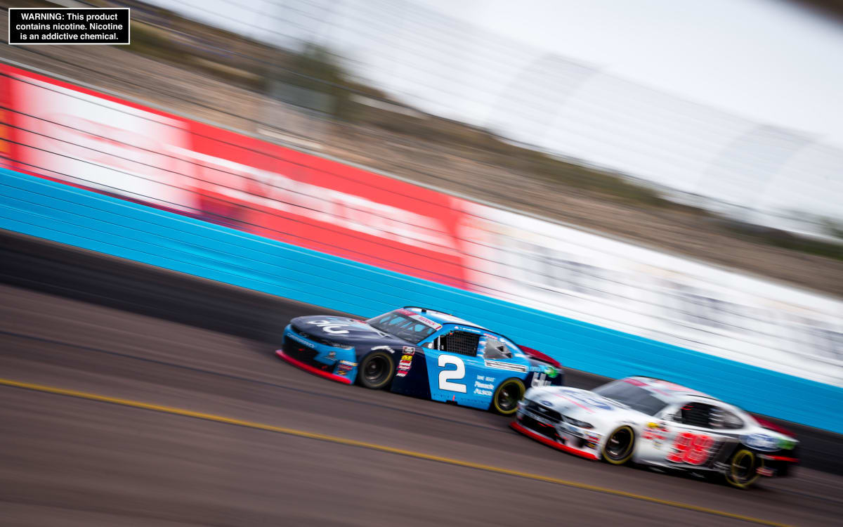 Tyler Reddick's No. 2 Chevrolet races with fellow playoff contender Chase Briscoe in the final stage of Saturday's NASCAR Xfinity Series race at ISM Raceway. Reddick finished third and advanced to the Championship 4 at Homestead-Miami Speedway.