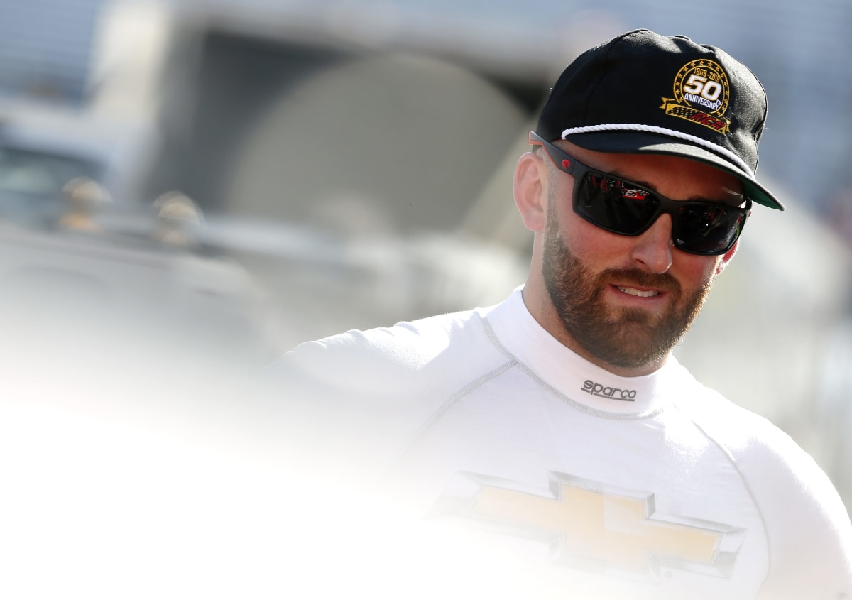 Austin Dillon sports a throwback RCR 50th anniversary hat prior to qualifying at Bristol Motor Speedway.