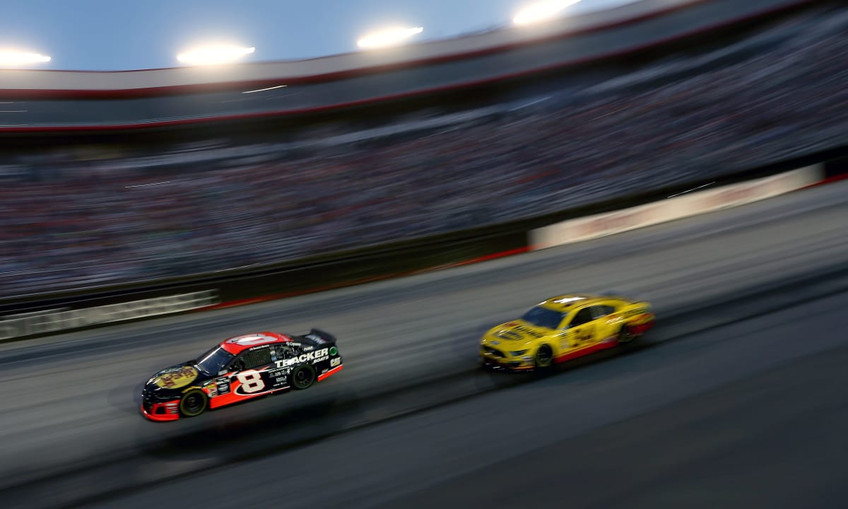Daniel Hemric's No. 8 Bass Pro Shops/Tracker Boats Chevrolet races with the No. 34 of Michael McDowell during the second stage of Saturday night's Bass Pro Shops Night Race at Bristol Motor Speedway. (Photo by Brian Lawdermilk/Getty Images)