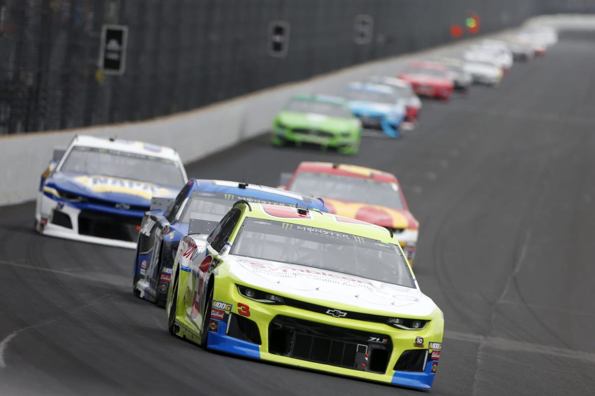 Austin Dillon's No. 3 Chevrolet leads a pack of cars into Turn 
1 during Sunday's Brickyard 400 at Indianapolis Motor Speedway.